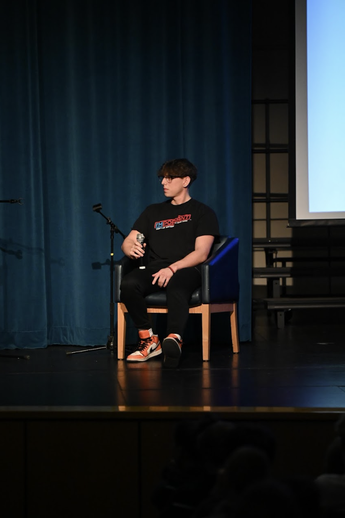 Dominic Cantrerra sits up on the stage, about to give a speech about suicide prevention. Highlands High School students gather together to listen to the compelling story of Dominic and his experience with mental health.